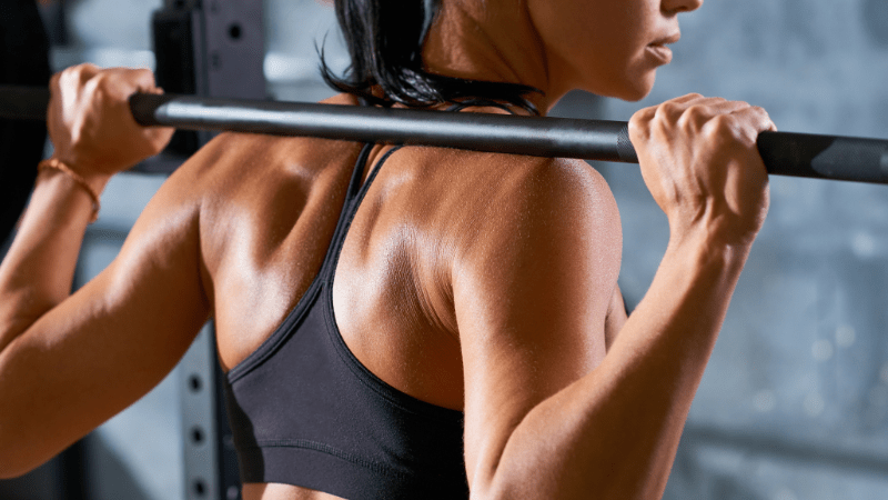 A woman exercising to build muscles